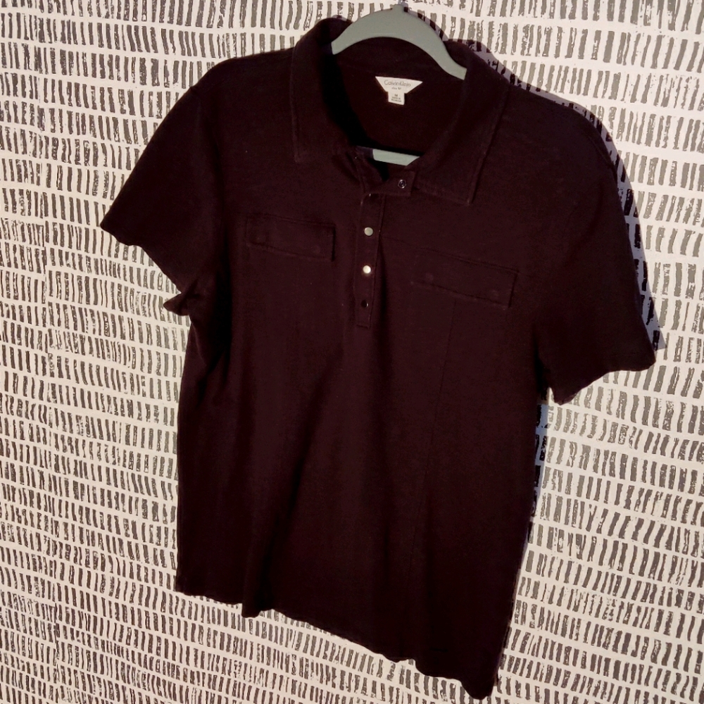 Black Calvin Klein polo with snaps